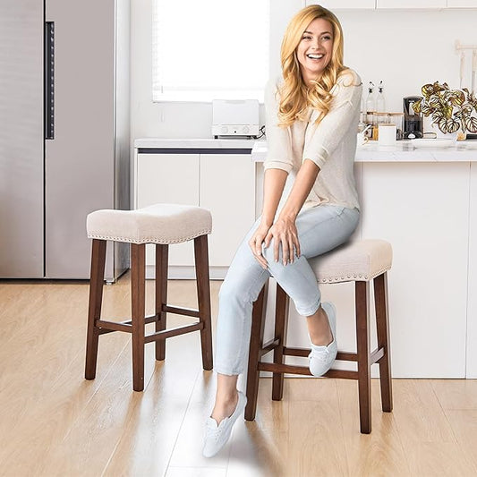 PrimeZone Counter Height Bar Stools Set of 4 - Backless Saddle Barstools with 4.3" Thick Upholstered, Nailhead Trim Linen Fabric & Solid Wood Legs, 26 Inch Counter Stools for Kitchen Island, Beige