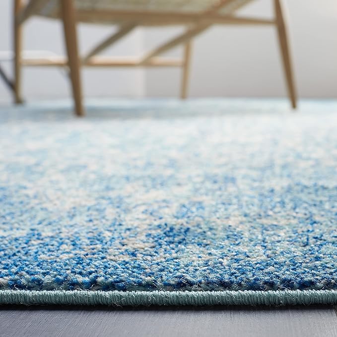 SAFAVIEH Evoke Collection Area Rug - 9' Round, Blue & Ivory, Distressed Design, Non-Shedding & Easy to Clean, Ideal for Living Room, Bedroom, Dining Space (EVK256C)
