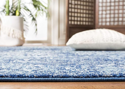 SAFAVIEH Evoke Collection Accent Rug - 2'2" x 5', Navy & Ivory, Distressed Design, Non-Shedding & Easy to Clean, Ideal for Front Door, Kitchen, Entryway, Accent Space (EVK256A)