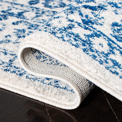 SAFAVIEH Evoke Collection 4' x 6' Ivory / Navy EVK256N Oriental Distressed Non-Shedding Living Room Bedroom Accent Rug